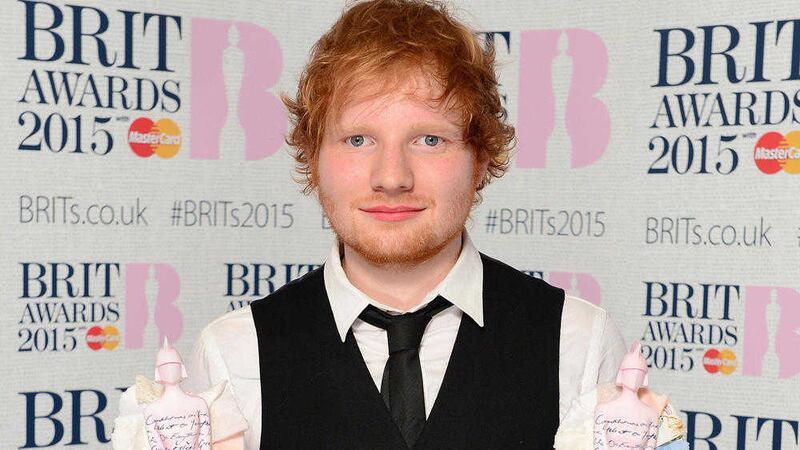 Ed Sheeran with his awards for Best British Male Solo Artist and British Album of the Year 