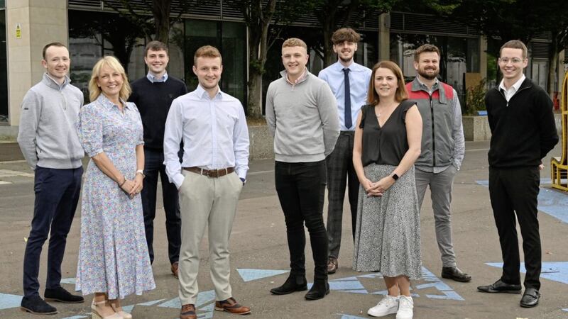 Ulster University&#39;s Ruth Mercer (second from left) and Danske Bank&#39;s Stacey Irvine&ndash;Herald (third from right), with some of the lenders new apprentices. 