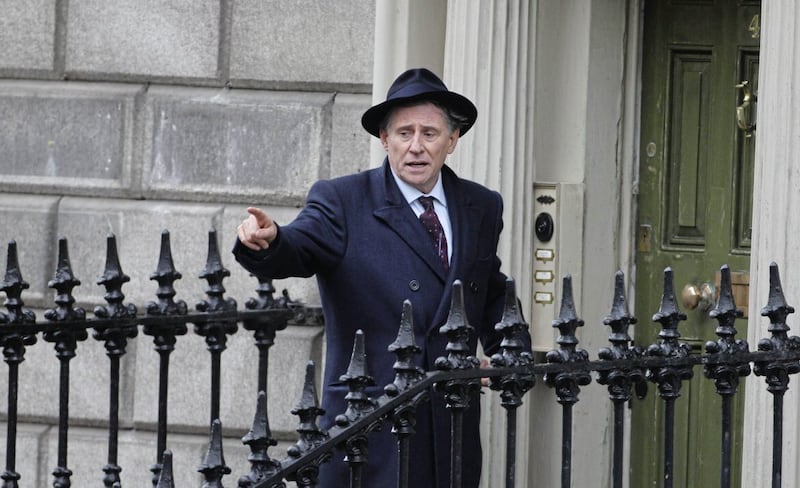 Gabriel Byrne during filming of the BBC Crime thriller Quirke in Dublin. PRESS ASSOCIATION Photo. Picture date: Wednesday December 19 2012. The programme is based on the books by Benjamin Black - a pseudonym of award-winning Irish writer John Banville. Photo credit should read: Niall Carson/PA Wire 