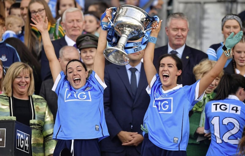 16 September 2018; Dublin players Sin&eacute;ad Goldrick, left, and Hannah O&#39;Neill celebrate with teh cup after the TG4 All-Ireland Ladies Football Senior Championship Final match between Cork and Dublin at Croke Park, Dublin. Photo by Brendan Moran/Sportsfile 