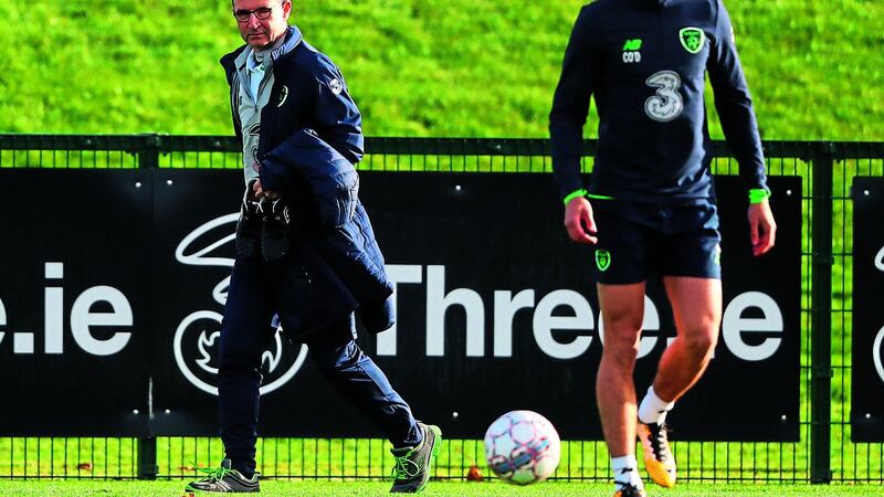 Callum O'Dowda with Republic of Ireland manager Martin O'Neill during a training session ahead of the play-off double-header with the Danes