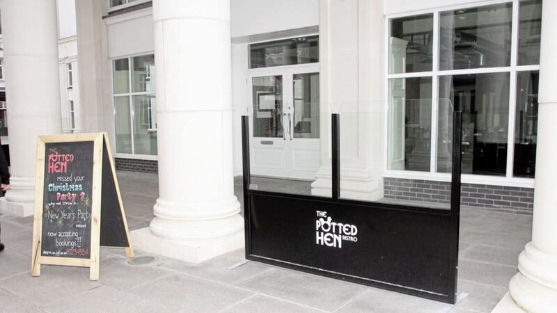 A director at DCRNI, which owned the Potted Hen in St Anne&#39;s Square, has been banned for five years 