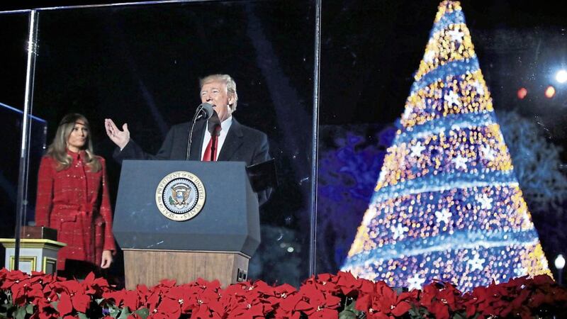 President Donald Trump during the lighting of the 2017 National Christmas Tree near the White House in Washington. Economist Joseph Stiglitz says Mr Trump has put the future of the North American Nafta free trade deal in doubt and that Britain is wasting its time seeking a trading arrangement with the president 