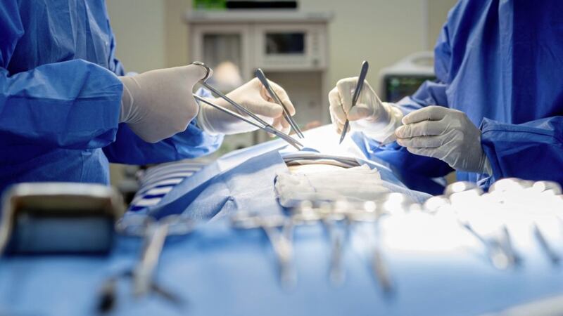 Belfast trust said it was essential to postpone surgery to &quot;ensure safe staffing levels&quot;