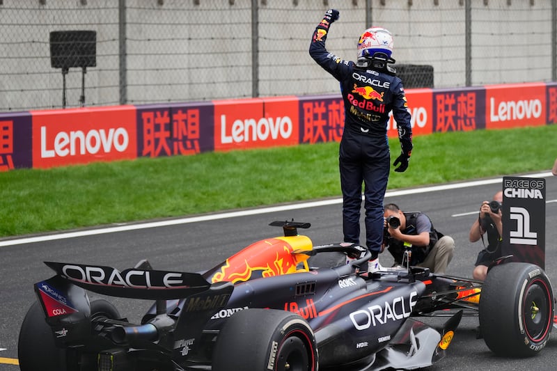 Max Verstappen celebrates winning the Chinese Grand Prix (AP)