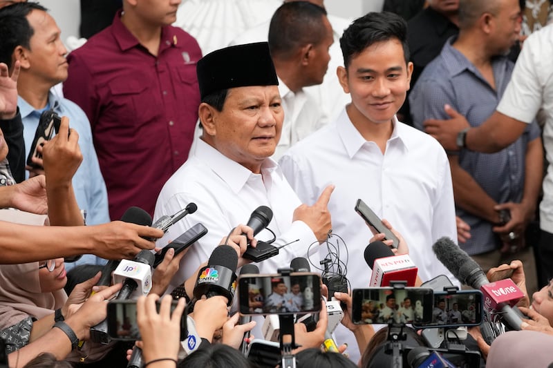 Subianto and his running mate Gibran Rakabuming Raka – the eldest son of Indonesian President JokoWidodo (AP)