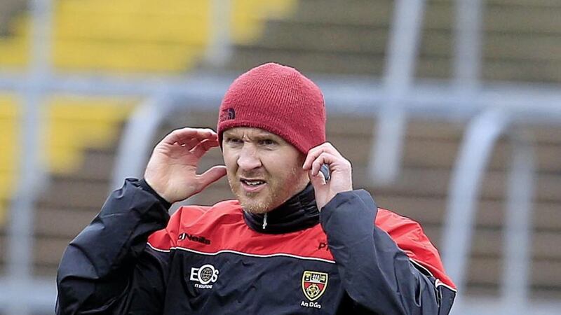 Down manager Paddy Tally is wary that the Division Three table could &quot;turn on its head&quot; this weekend.<br /> Pic Philip Walsh.