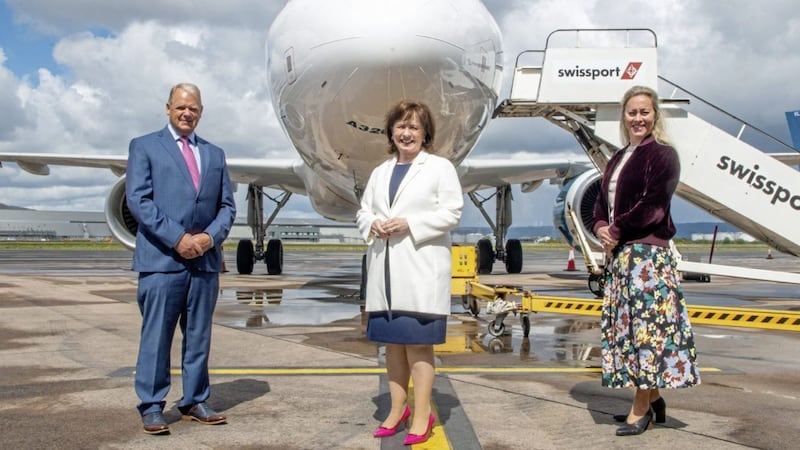 Economy Minister Diane Dodds (centre) at Belfast City Airport with airport boss Brian Ambrose and commercial director Katy Best.  