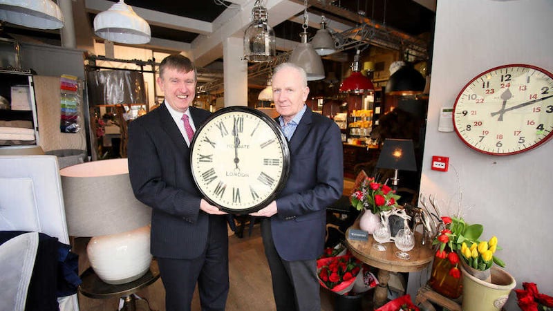 Finance minister Mervyn Storey is joined by Robert Brown, owner of Herbert Gould Home on Belfast&rsquo;s Lisburn Road   