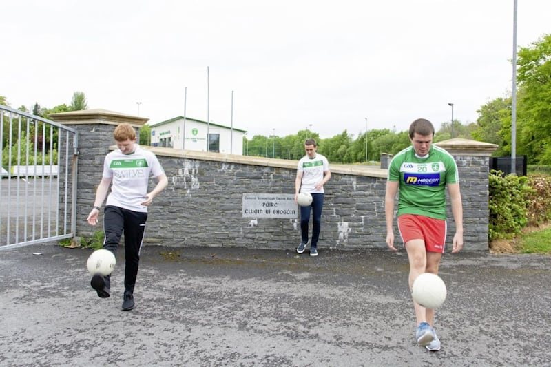 Drumragh Sarsfields senior footballers Eoin McGread, Barry Fitzgerald and Paddy Roche get in a final few solos after the completion of The Great Solo Re-Run on Saturday May 16 2020. Picture by Rory Cox 