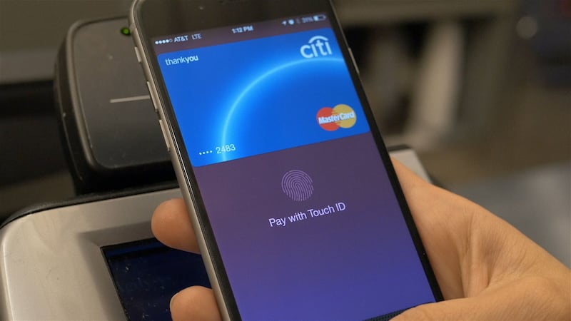 Apple says iPhone users will now be able to access their bank balance in the Wallet app (Apple/PA)