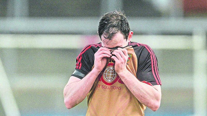 Down's Conaill McGovern leaves the field after the National League defeat to Cork at P&aacute;irc U&iacute; Rinn