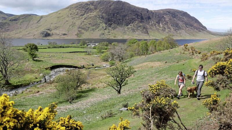 Walkers visiting in the Lake District in Cumbria. Children believe that spending time in nature can give their school work a boost, according to research 