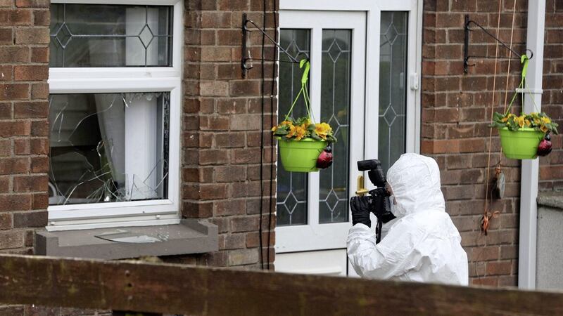Crime scene investigators at a property in Moyne Gardens, Newtownards where a man in his sixties was treated by paramedics following an arson attack. Picture by Mal McCann 