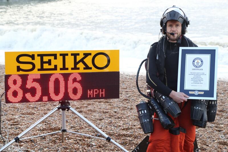 Richard Browning with the Guinness World Record for the fastest speed in a body-controlled, jet engine-powered suit