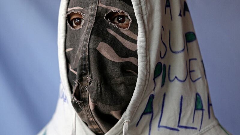 A portrait of a militant taken in Kashmir several years ago. Picture by Cathal McNaughton 