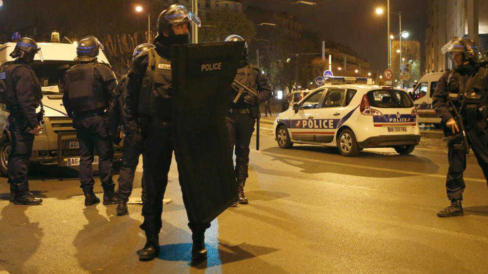 French police in Paris prepare for a raid in the northern suburb of St Denis&nbsp;