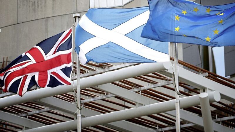 A union flag, saltire and European flag flying outside the Scottish Parliament, Edinburgh 