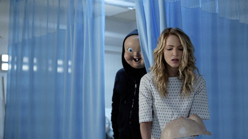 The masked killer and Jessica Rothe as Tree Gelbman, Happy Death Day 2U 