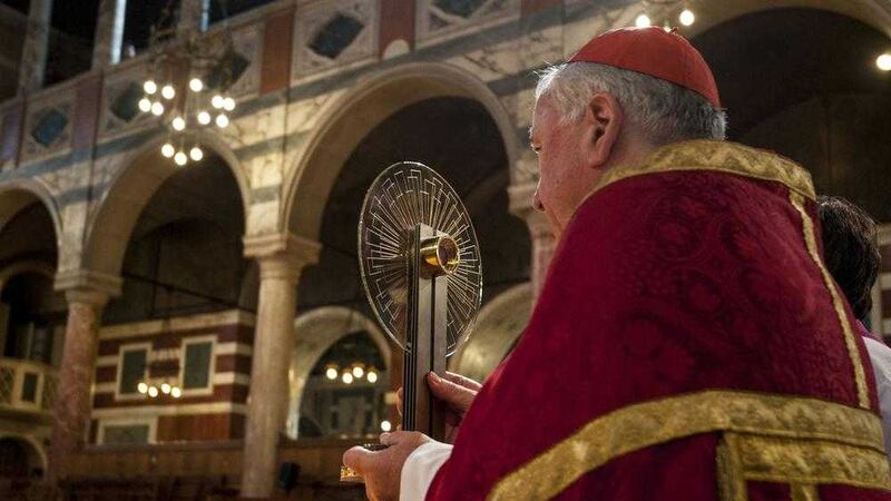 Cardinal Vincent Nichols holds a relic of Thomas Becket as it is returned to England. Picture by Lauren Hurley/PA Wire 