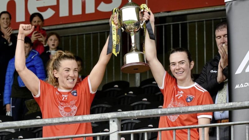 Armagh ladies senior football captain Kelly Mallon (left) lifts the Ulster LGFA O&#39;Harte Cup with her vice-captain Sarah Marley after winning a thriller against Donegal. 