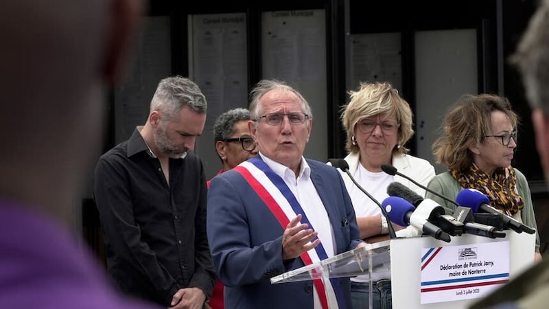 Nanterre mayor Patrick Jarry speaks at a rally outside the town hall in the Paris suburb of Nanterre (Nicolas Garriga/AP)