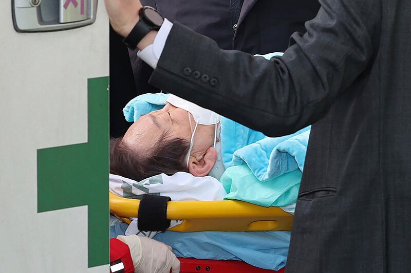 South Korean opposition leader Lee Jae-myung was flown to hospital in Seoul by helicopter (Im Hwa-young/Yonhap/AP)