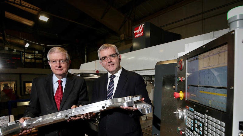 Enterprise Minister Jonathan Bell and David Dobbin, chairman of the new Energy and Manufacturing Advisory Group, which launched at Marlborough Engineering in Belfast yesterday. Pic by Matt Mackey, Presseye 