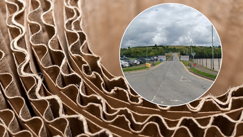Close up of corrugated cardboard with a smaller image inset of Carnbane Industrial Estate.