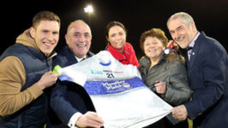 John McAreavey, Kieran Kennedy, from O'Neills, Kelley Faye, SINI, Roisin Foster, CEO of Cancer Focus NI, and Tyrone manager Mickey Harte got their torches out at last night's player launch of the 24-hour GAA marathon match to be played on January 7 and 8 at the GAA's Garvaghey Centre in Tyrone, which is hoped to break the Guinness World Record for the longest game of Gaelic football