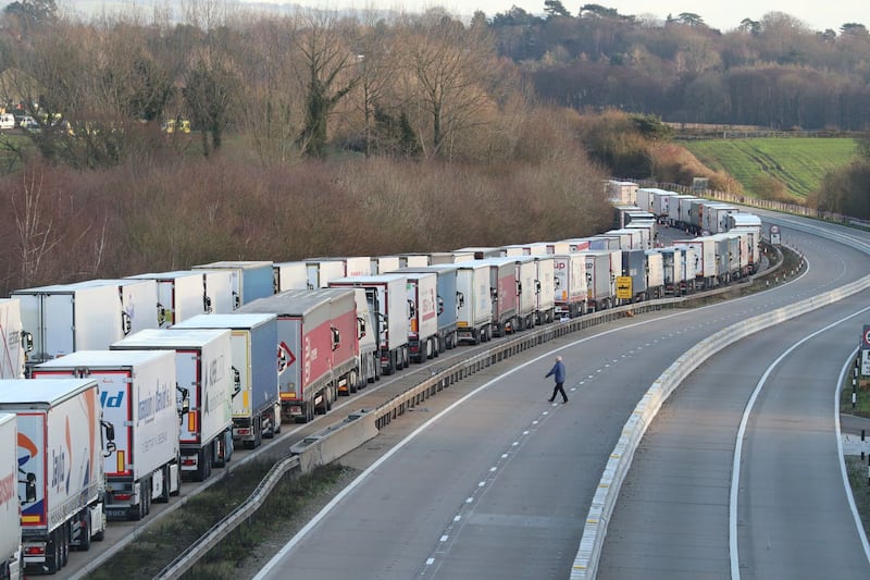Freight lorries lined up on the M20 near Ashford, Kent