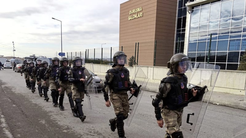 Paramilitary police officers arrive to secure the entrance of Silivri prison complex yesterday where 29 Turkish former police officers are on trial. Picture by Mehmet Guzel, Associated Press 