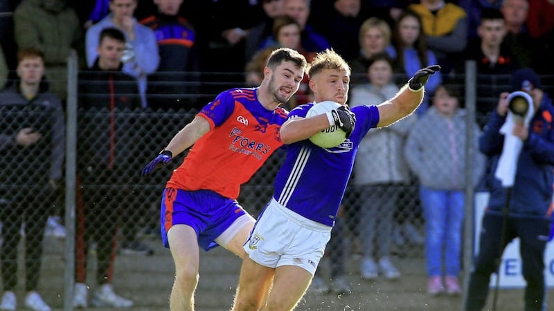 Wing-back Colm O'Neill (right) proved a hero for Dromore, kicking two points in the Tyrone SFC preliminary round victory over Ardboe.<br />Picture Seamus Loughran&nbsp;