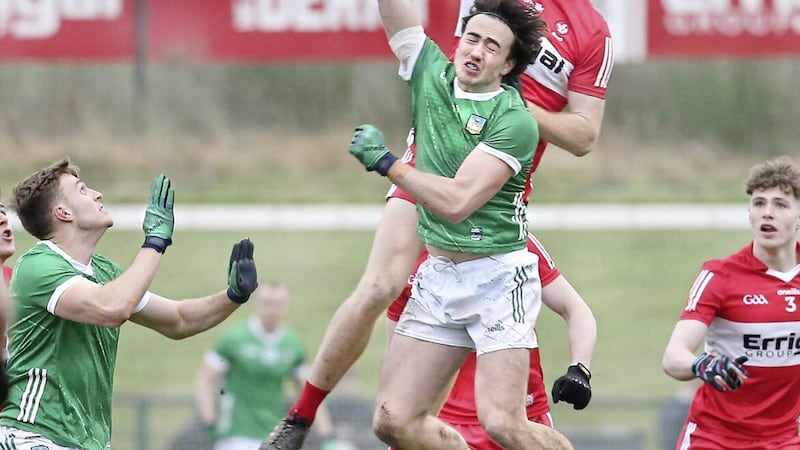 Derry Conor Glass rises above Cian Sheehan of Limerick during the Division Two opener at Owenbeg.
