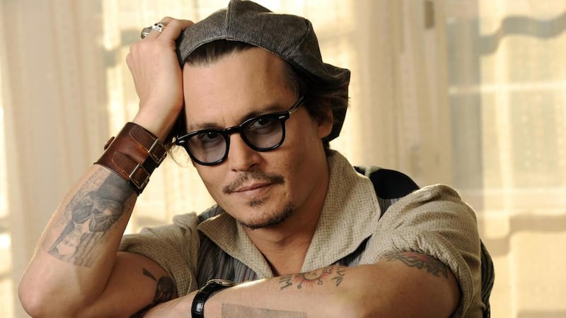 Johnny Depp and his wife Amber Heard have been accused of &#39;sneaking&#39; their two dogs into Australia and bypassing quarantine 