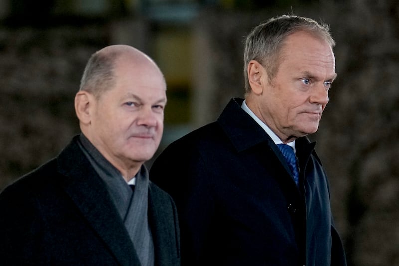 German chancellor Olaf Scholz, left, welcomes Poland’s Prime Minister Donald Tusk in Berlin (Ebrahim Noroozi/AP)