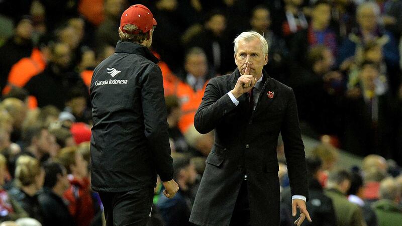 PARD TIMES: Alan Pardew and Jurgen Klopp exchange views during Crystal Palace&rsquo;s win over Liverpool at Anfield yesterday&nbsp;