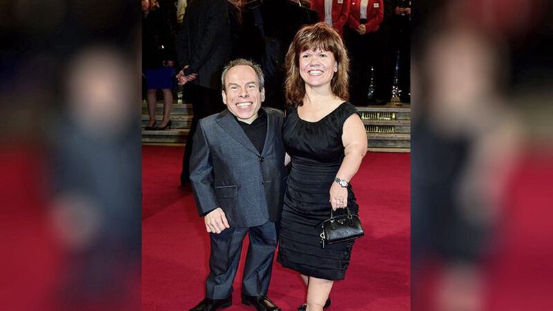 Warwick Davis and his wife Samantha, as the Harry Potter star has criticised Twitter after a troll posted an abusive message about his family online. Picture by Ian West, Press Association 