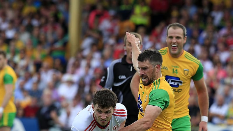 Rory Brennan in action against Donegal&rsquo;s Paddy McGrath during Sunday&rsquo;s win over Donegal. The Trillick man impressed after replacing Michael McKernan early in the game