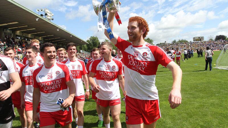 Hawthorn-bound Conor Glass parades the Fr Murray Cup after Derry captured the Ulster Minor title in Clones 