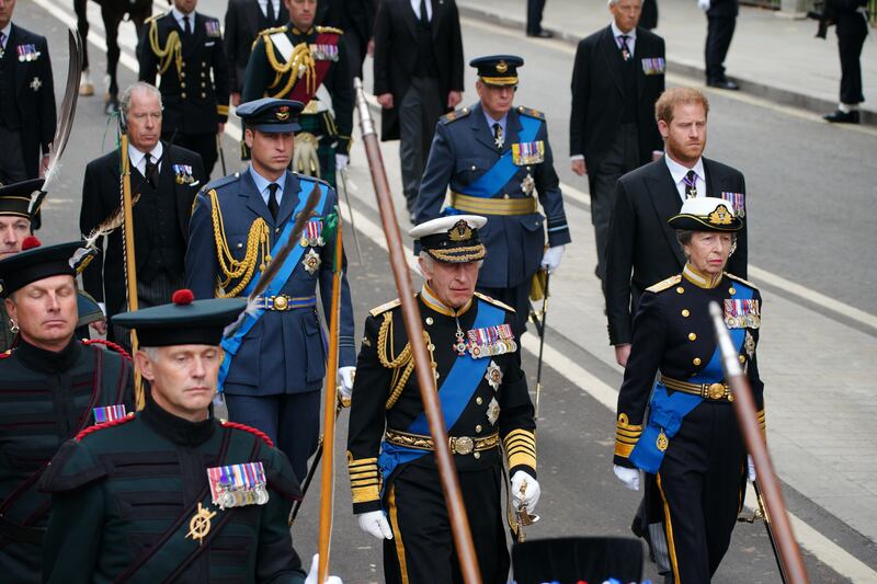 The Prince of Wales, King Charles III, the Princess Royal and the Duke of Sussex following the State Gun Carriage carries the coffin of Queen Elizabeth II