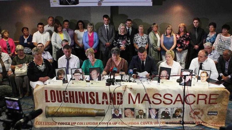 Relatives and victims of the Loughinisland Massacre along with solicitor Niall Murphy. Picture Matt Bohill. 