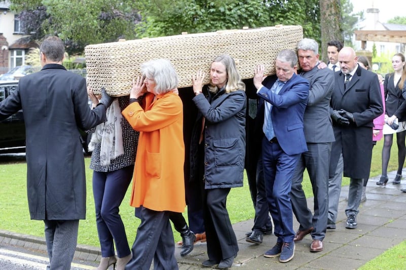 Mr Fitzpatrick&#39;s family carry his coffin from the church. Picture by Mal McCann. 