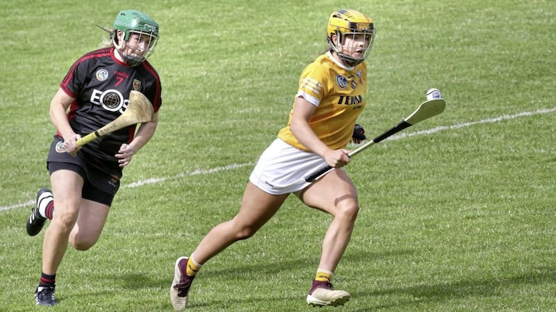 Down Deirbhile Savage with Maeve Kelly of Antrim at Owenbeg during the National Camogie Leagues Division 2 Final on Saturday 19th June 2021. Picture Margaret McLaughlin. 