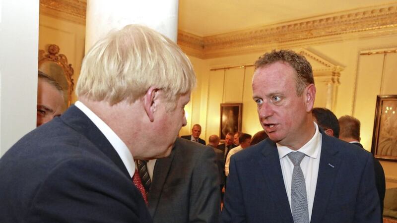 Stephen Kelly greets British prime minister Boris Johnson at the Trade NI event in Westminster