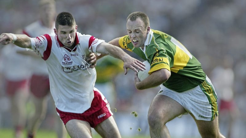 Kerry's John Crowley tries to fend off a challenge by Tyrone's Ciaran Gourley during the 2003 All-Ireland SFC semi-final. The U20 meeting of the two counties this weekend could affect the Red Hand seniors' plans.<br />Pic Ann McManus