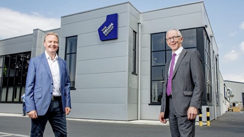 The Deluxe Group&rsquo;s business development manager, Richard Hill (left) with Brian Dolaghan, executive director of business solutions, Invest NI. 