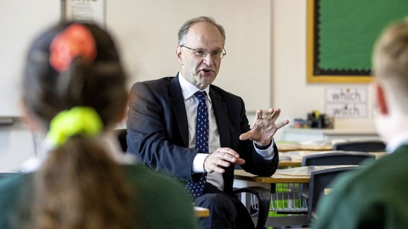 Education Minister Peter Weir talking with pupils on the student council at St Joesph&#39;s Primary School, Carryduff, in April. File picture by Liam McBurney, Press Association 