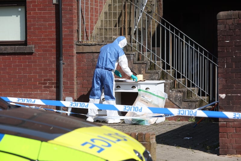 Forensic officer at a property in James Street Ballymena. Picture Mal McCann