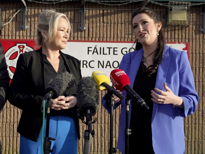 Michelle O’Neill and Emma Little-Pengelly after their visit to St Paul’s GAA club in west Belfast